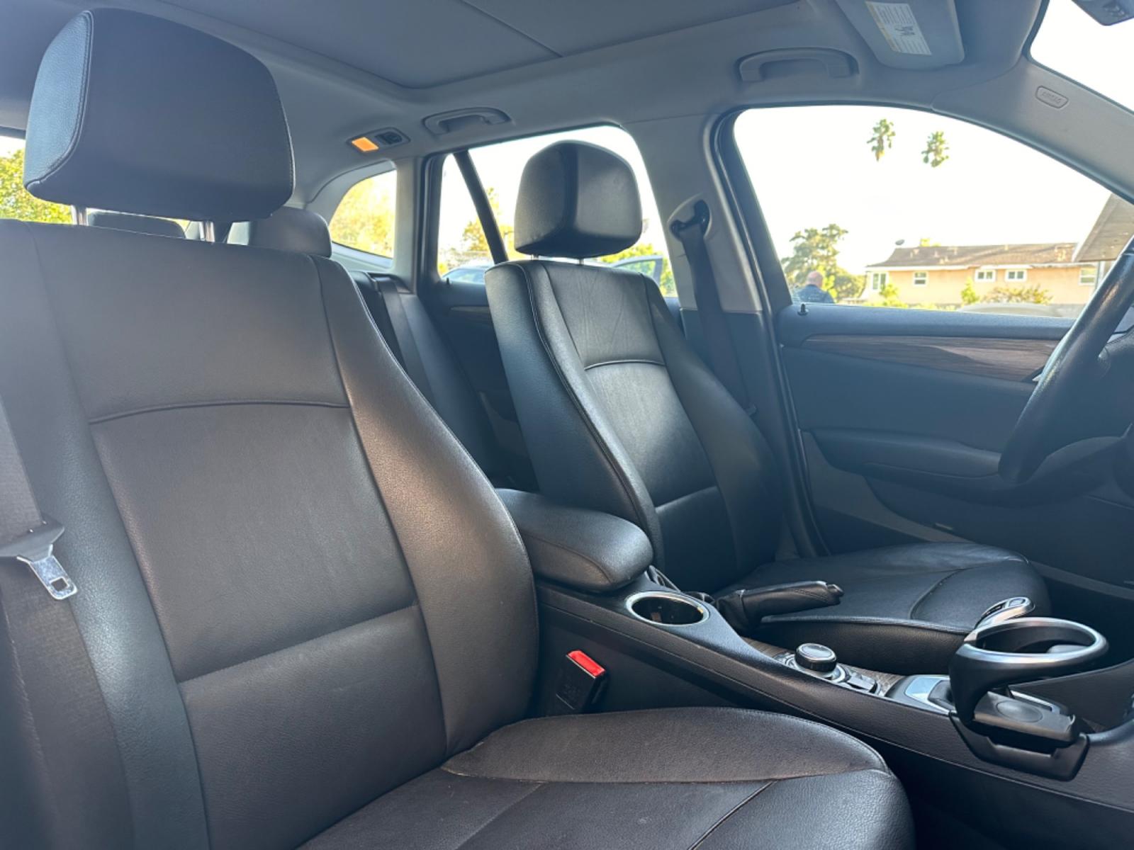 2014 WHITE /Black BMW X1 Leather (WBAVL1C56EV) with an 4 Cylinders engine, AUTOMATIC transmission, located at 30 S. Berkeley Avenue, Pasadena, CA, 91107, (626) 248-7567, 34.145447, -118.109398 - Don't let bad credit or financial setbacks hold you back from owning a luxury SUV like the 2014 BMW X1 xDrive28i. At our BHPH dealership, we're here to make the car-buying process as smooth and stress-free as possible. We invite you to visit our dealership in Pasadena, CA, to explore our inventory o - Photo #11